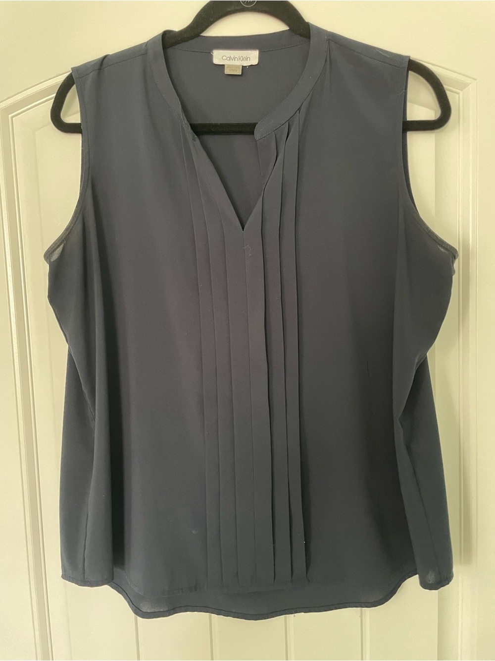 Calvin Klein navy sleeveless blouse